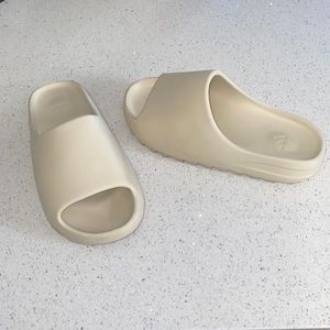 Yeezy slides. Size men US 10. Bone color way